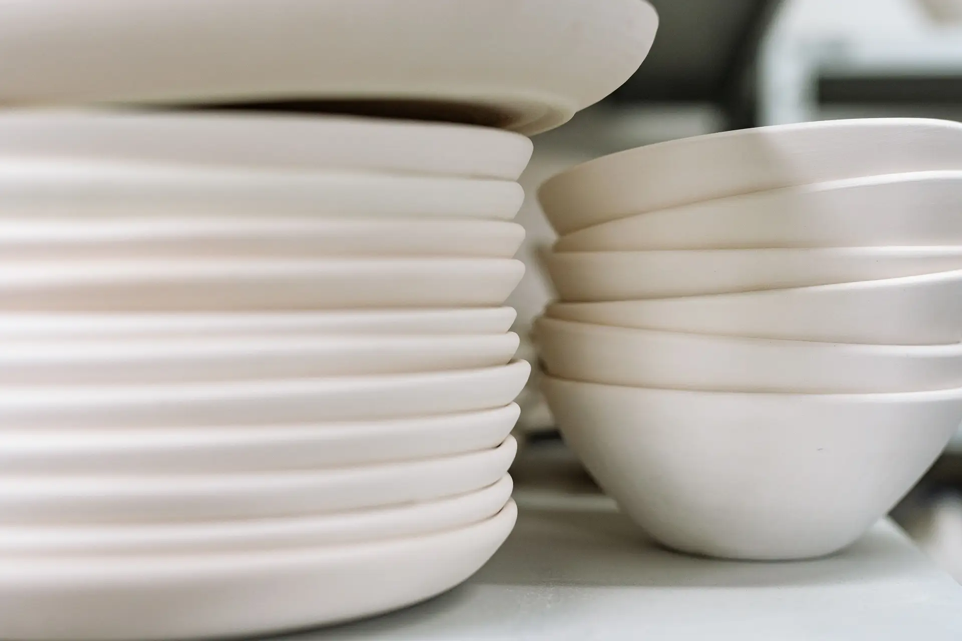 Stacked ceramic plates showcasing fine craftsmanship